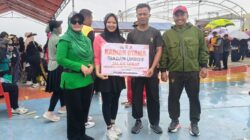 Jelang HUT Bhayangkara, Ribuan Warga Antusias Ikuti Jalan Santai, Isteri Anggota Kodim Raih Hadiah Umroh